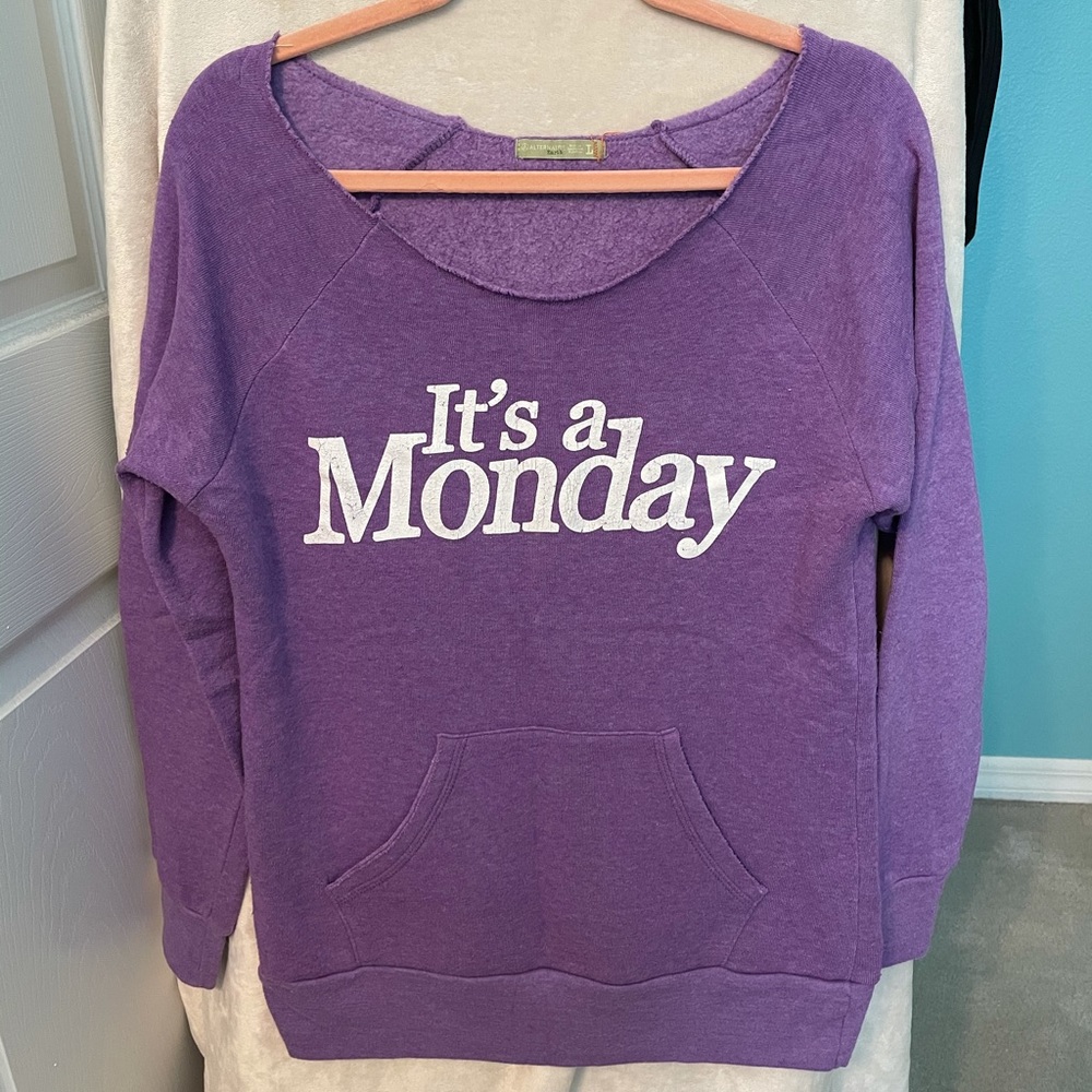 “It’s a Monday” off the shoulder purple sweatshirt